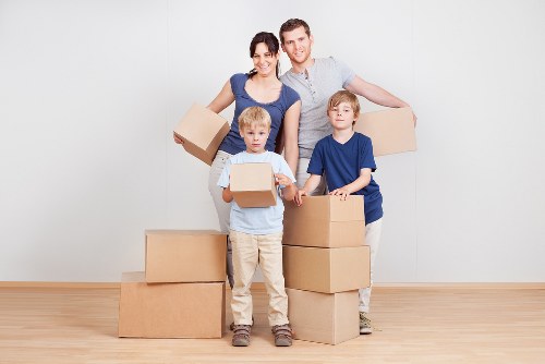 Packed office furniture and equipment ready for transport in central London