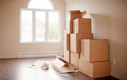 Unpacking boxes in a Barbican apartment after delivery