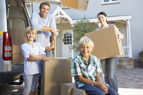 Local moving team handling boxes in Barbican
