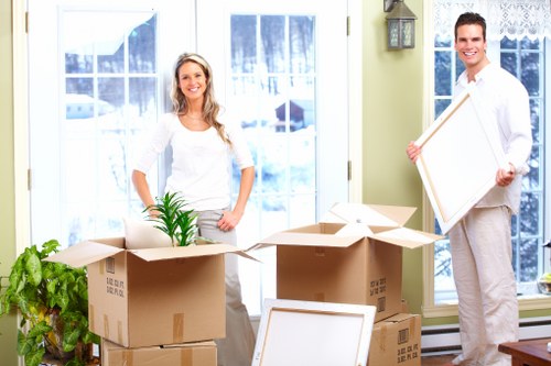 Packed moving boxes and furniture protection for a Barbican relocation