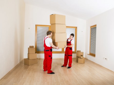 Moving van and crew preparing for a Barbican house relocation